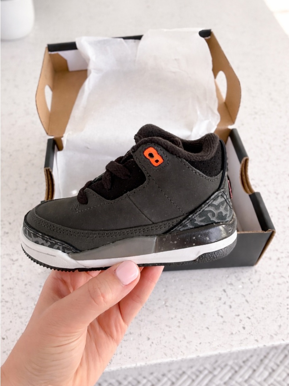 Jordan Toddler Black Sneakers with Orange Accent